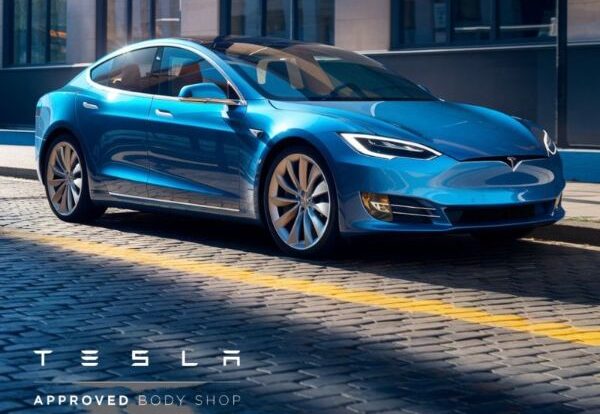 Blue Tesla on street Alioto's Tesla Approved Body Shop