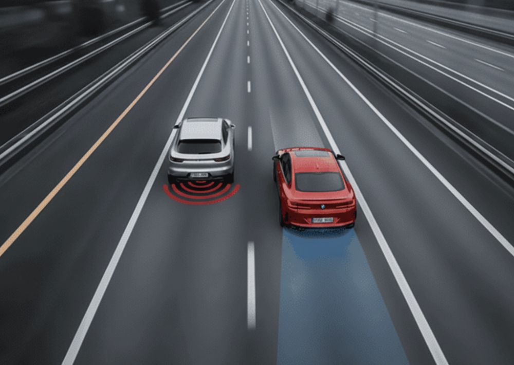 Red and silver BMW cars on highway showing how ADAS works for Alioto’s Auto Body San Francisco Red-and-silver-BMW-cars-on-highway-showing-how-ADAS-works-for-Aliotos-Auto-Body-San-Francisco