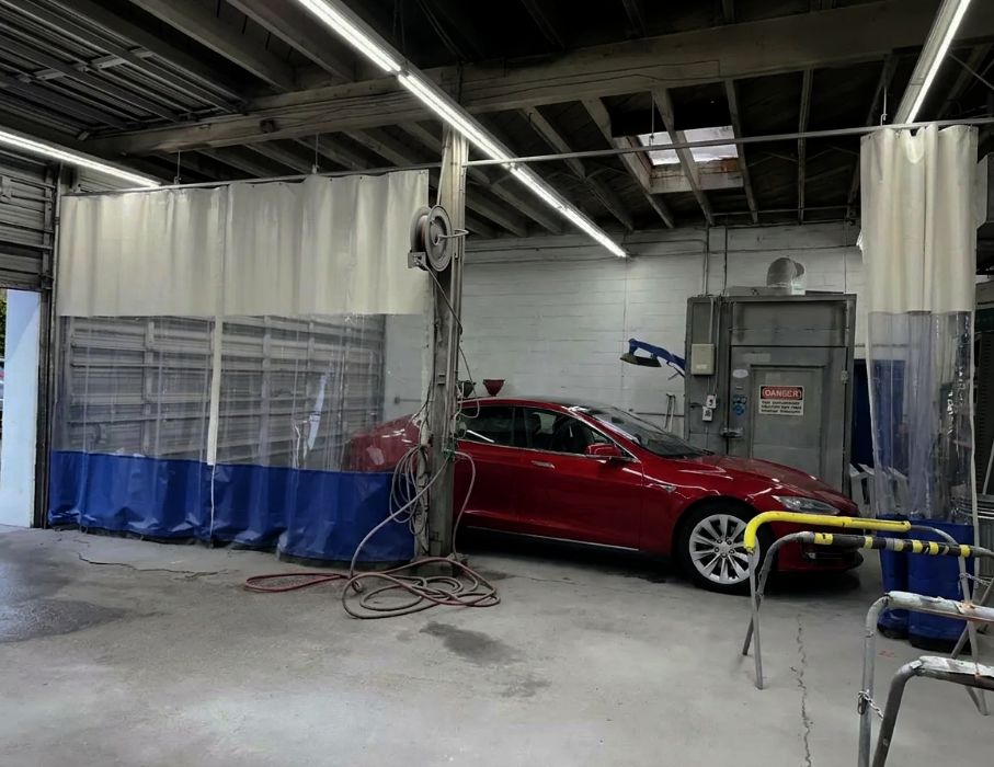 Rivian-on-a-lift-for-a-Certified-Inspection-Aliotos-Auto-Body-San-Mateo